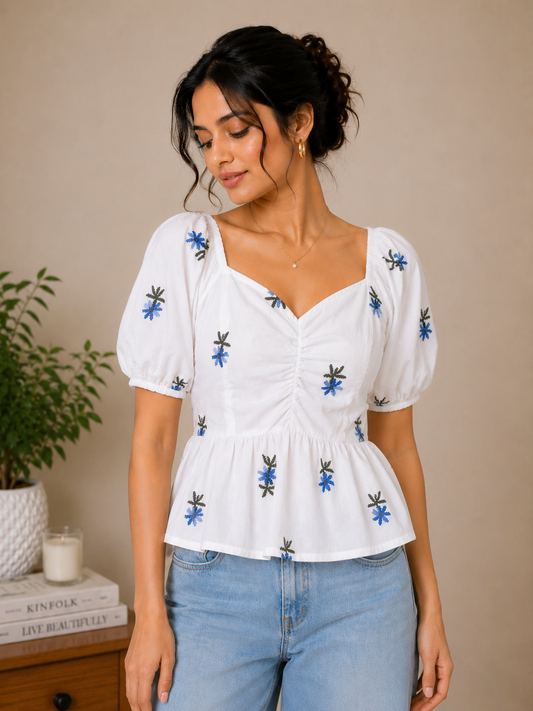 White Top With Blue Floral Embroidered Peplum Top