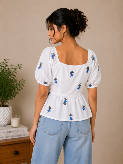 White Top With Blue Floral Embroidered Peplum Top