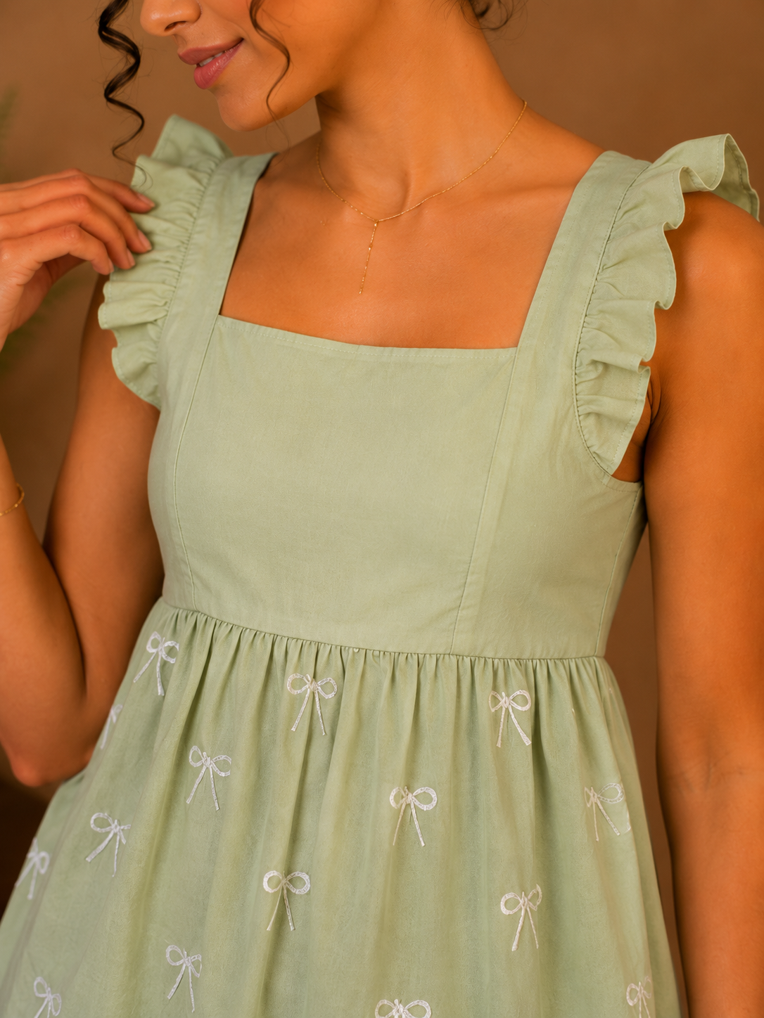 Floral Bow Embroidered Peplum Top