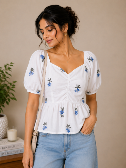 White Top With Blue Floral Embroidered Peplum Top